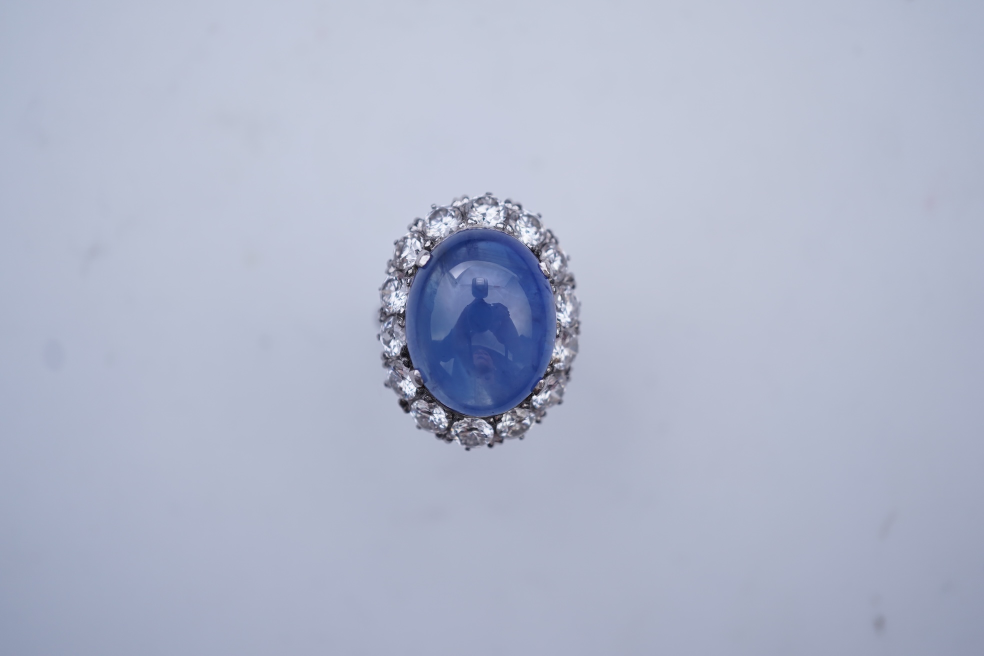 A sapphire and diamond ring, mid 20th century